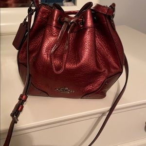 Iridescent cranberry Coach purse